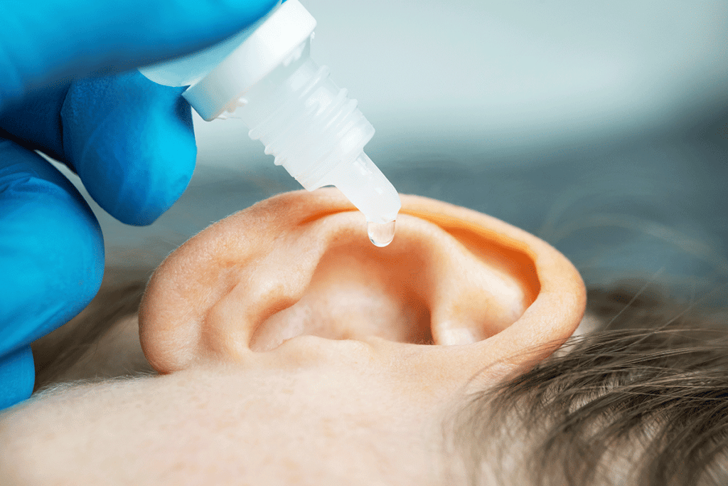 Child using Peroxide to clean ears
